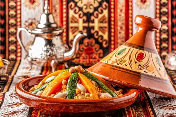 What's the Secret to Crafting a Flavorful Moroccan Tagine with Apricots and Almonds?